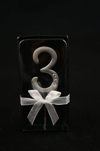 ON CAKE SERVER/CROSS. "3